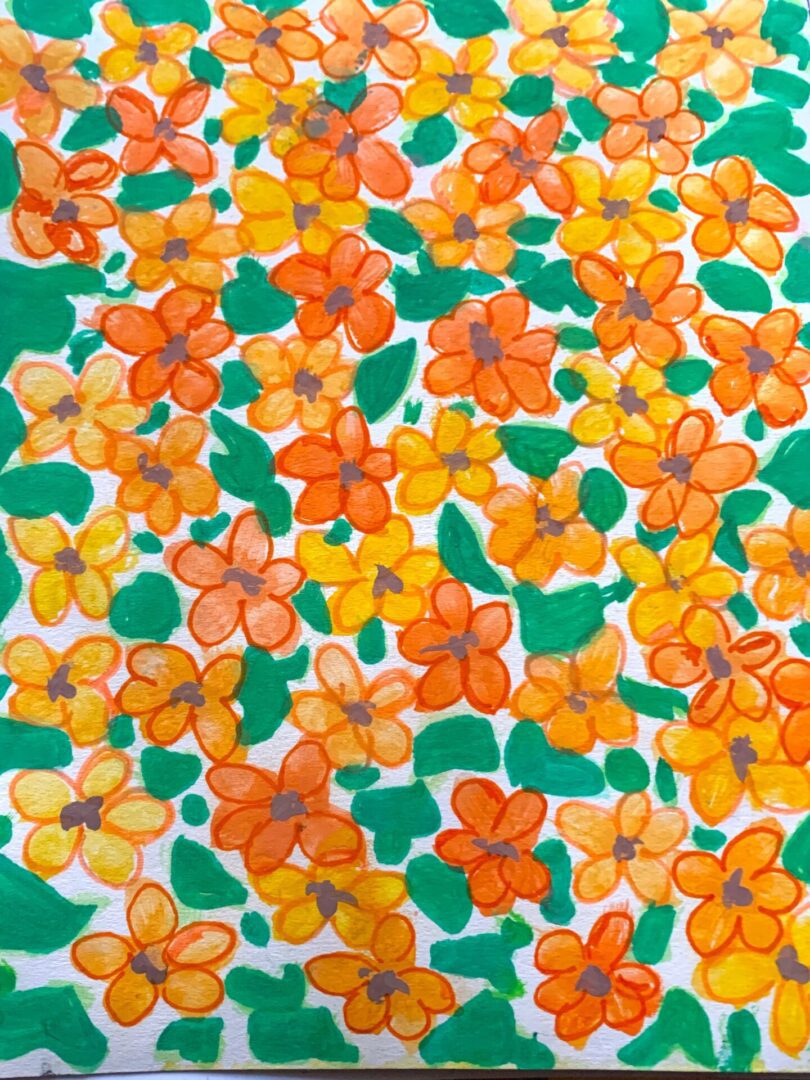 Orange and yellow floral pattern with green leaves