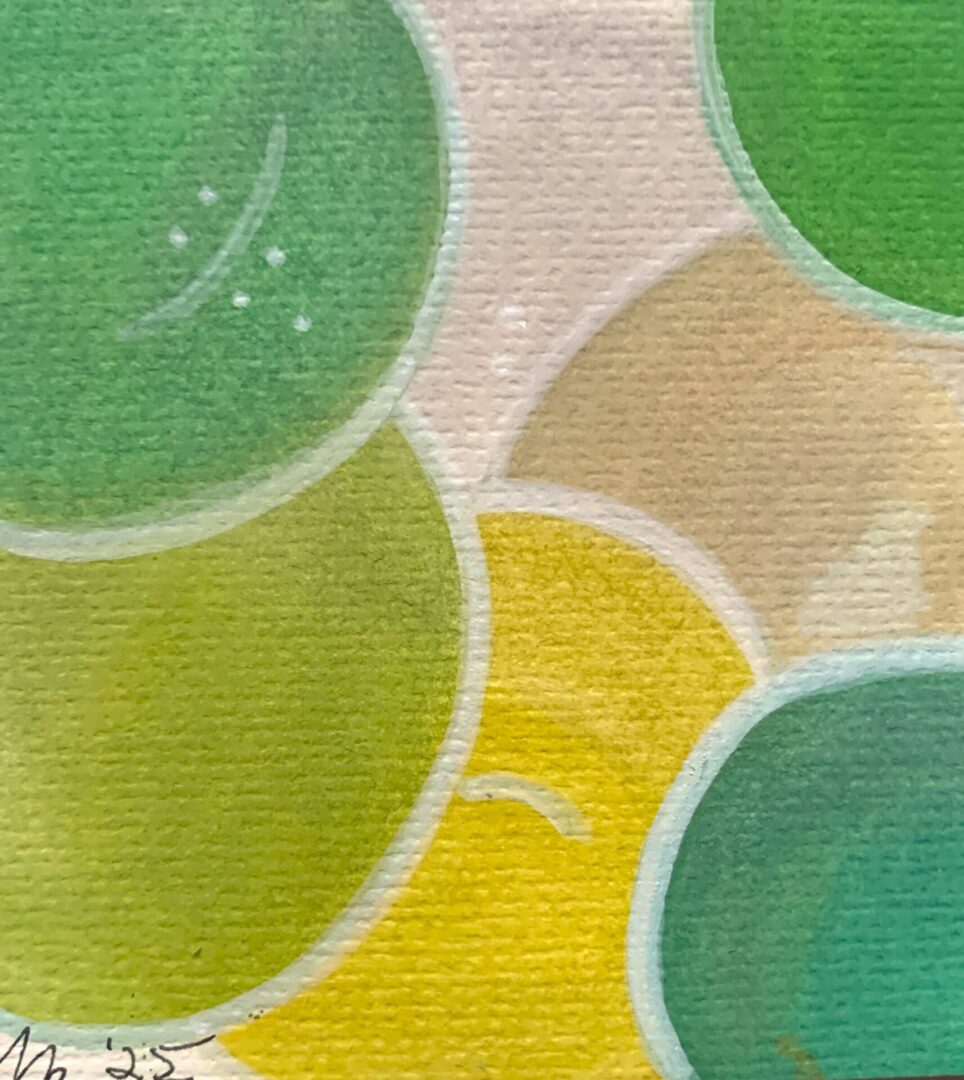 Abstract overlapping painted circles in green and yellow