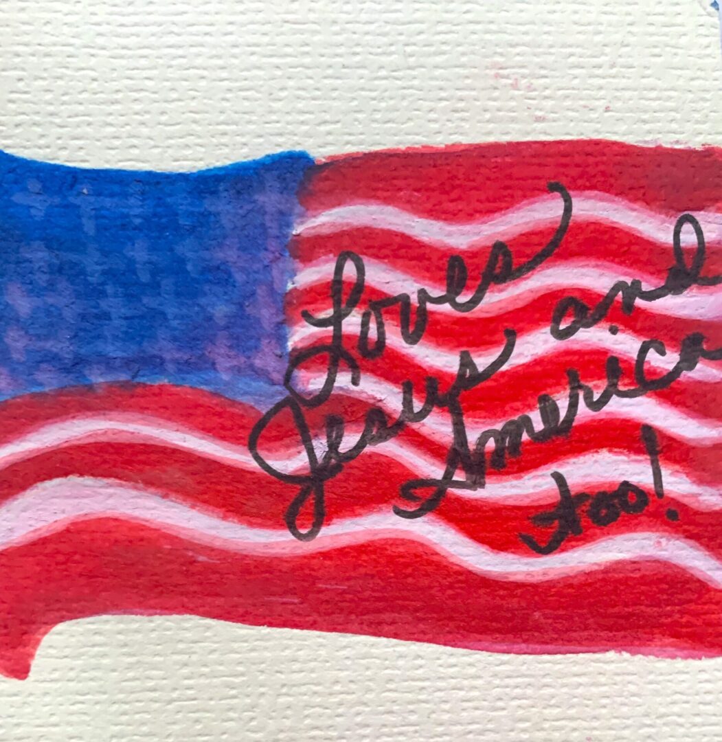 American flag with handwritten "Loves Jesus