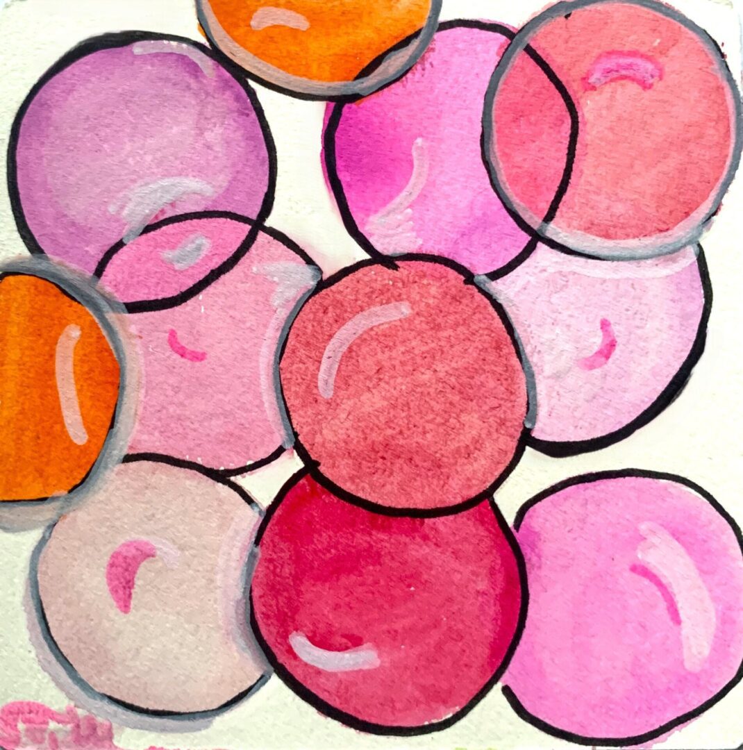 Overlapping watercolor circles in pink and orange
