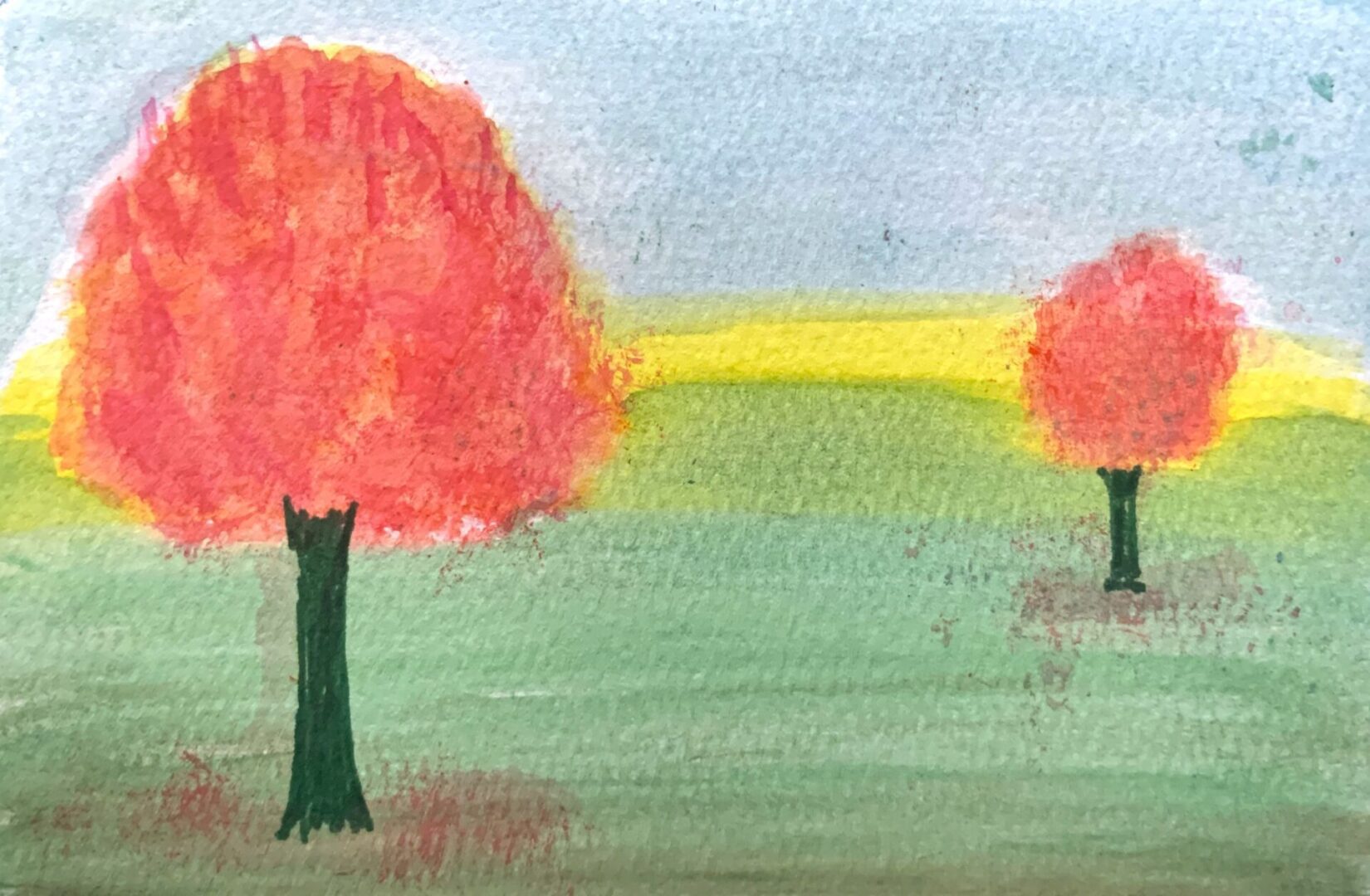 Watercolor of two red trees in field
