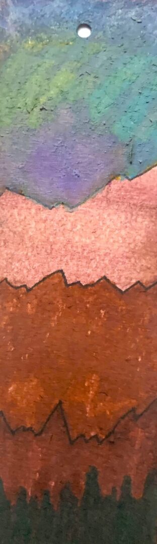 Abstract layered painted metal resembling mountain silhouettes